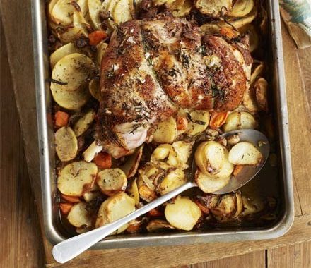 Garlic roast lamb with hotpot potatoes recipe
