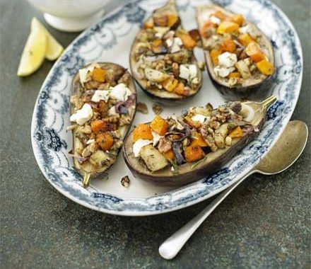 Baked aubergine stuffed with roast pumpkin, feta & walnut with minted courgettes recipe