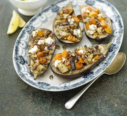 Baked aubergine stuffed with roast pumpkin, feta & walnut with minted courgettes recipe 
