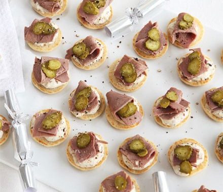 Blinis with crème fraîche, roast beef & cornichons recipe