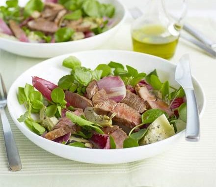 Lamb steaks with artichoke salad recipe