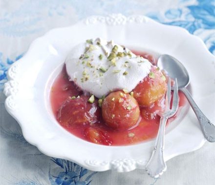 Syrupy plums with pistachio meringues recipe