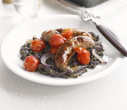Saucy roast sausages with lentils recipe