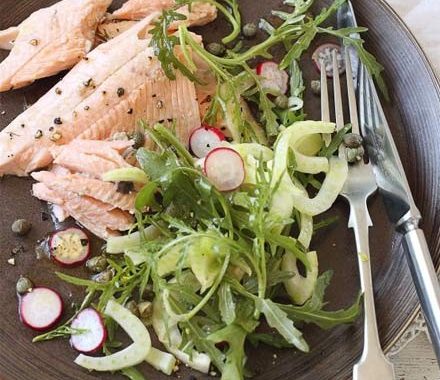Baked trout with fennel, radish & rocket salad recipe