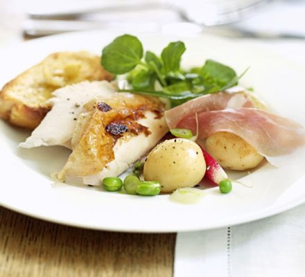 Herby roast chicken with garlic lemon toasts recipe 
