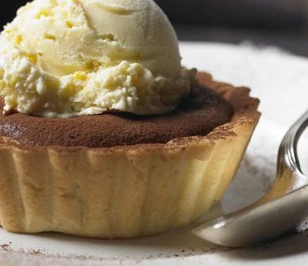 Warm choc-orange tarts with orange ice cream recipe