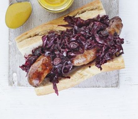 Sausages with warm red cabbage & beetroot slaw recipe