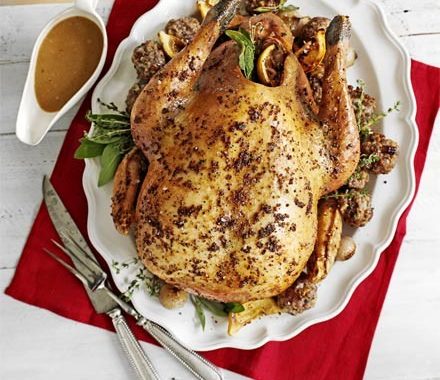Roast turkey with pecan, sausage & chestnut stuffing & roast shallots recipe