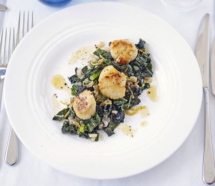 Seared scallops with flavoured greens recipe