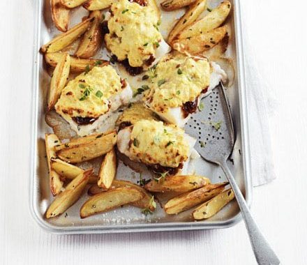 Cheese & onion rarebit-topped pollock with potato wedges recipe