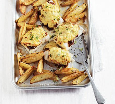 Cheese & onion rarebit-topped pollock with potato wedges recipe 