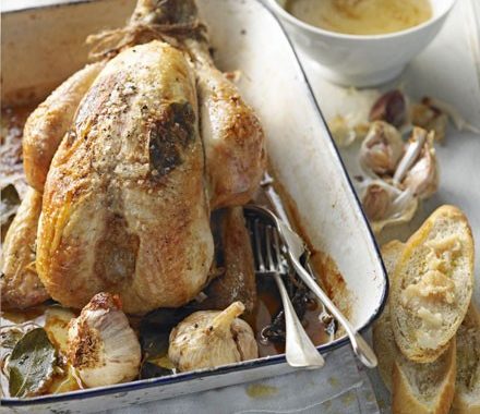 Roast chicken with whole garlic, bay & white wine recipe