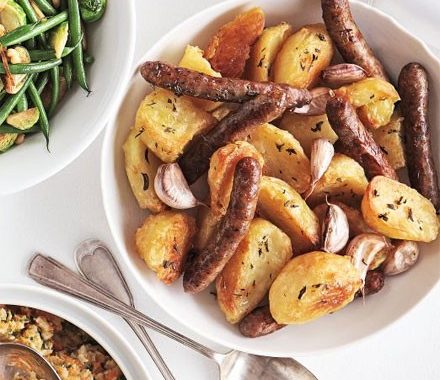 Rosemary & garlic roast potatoes with chipolatas recipe